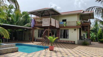 Well Maintained 21 Guntha Ready Farmhouse For sale in karjat with Big Swimming Pool.