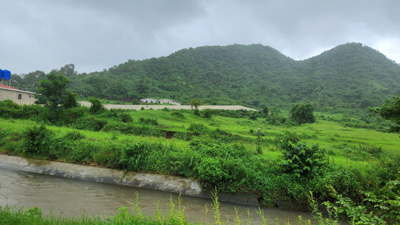 Mountain & Canal touch 7 acre agriculture land for sale 10km from Karjat station.