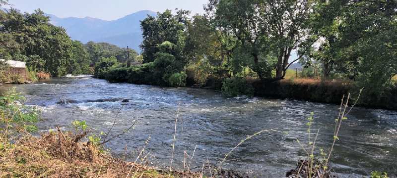 12 Montha flowing rivertouch 1 Acre Land for sale Tata Road, Karjat Mountains view
