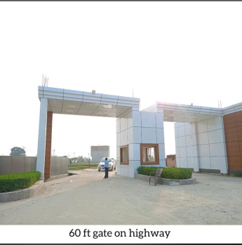 100 sq yard plot in gated township on highway