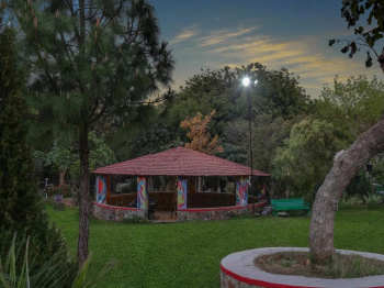 One acre fully developed farm house in garatpur bas village