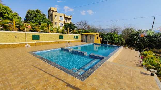 Mountain view Farmhouse cum Holiday Home for Sale in Karjat. 4bhk on 53 Guntha Land.