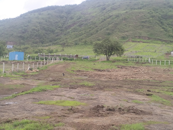 Investors land for sale on entrance of Industrial corridor in Pune.