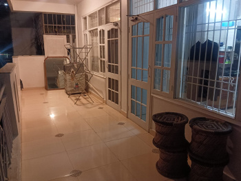 Ready to move, semi furnished, spacious, sunny and centrally located  flat at a prime scenic location on outright sale, non-Agriculturists can buy
