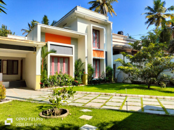A Modern House With a large courtyard at Vellayanai, Thiruvanathapuram