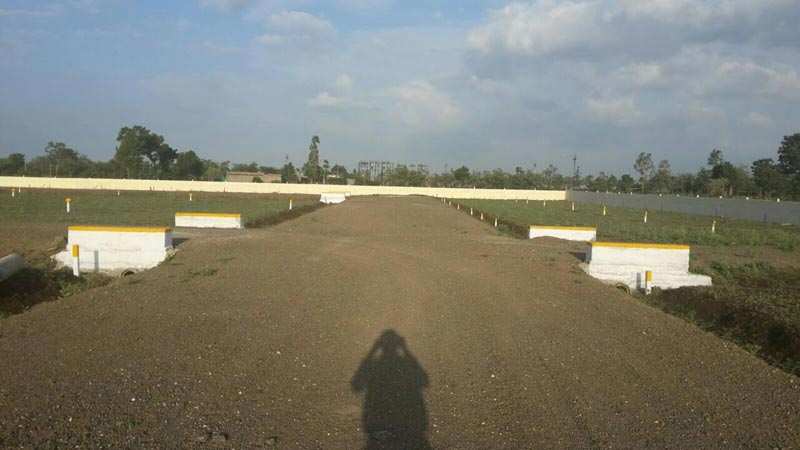 Ozar 15 mtrs road touch N.A plots for selling NH-3